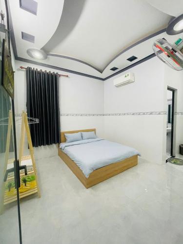 Postel nebo postele na pokoji v ubytování Cactus Homestay Phan Rang