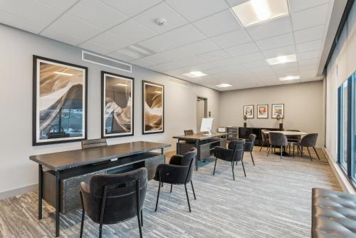 a waiting room with desks and chairs in a building at Pioche Village Park City in Park City