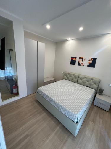 a bedroom with a bed in a room at Echoes in Campobasso
