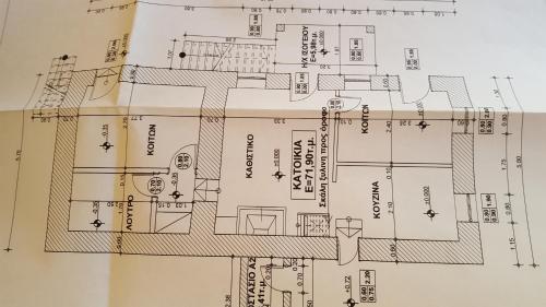 a drawing of a building on a sheet of paper at Chios Stone House in Chios