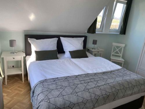 Postel nebo postele na pokoji v ubytování Veojano Ferienwohnung