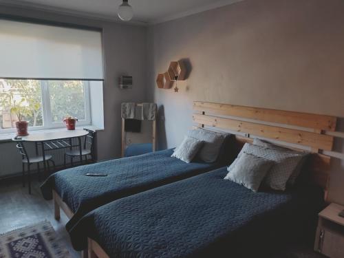 Postel nebo postele na pokoji v ubytování Le Rustique
