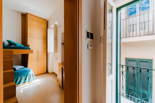 En eller flere senge i et værelse på Dimora storica Torre Matta Otranto