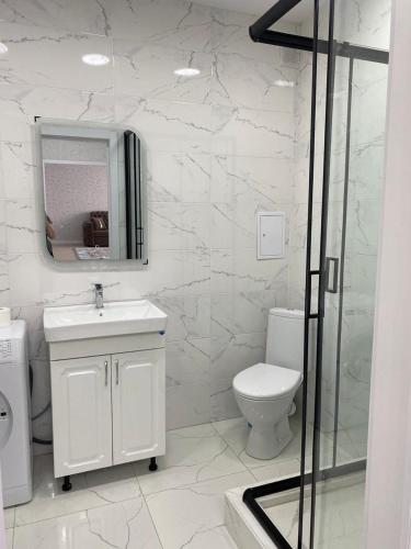 Koupelna v ubytování Квартира