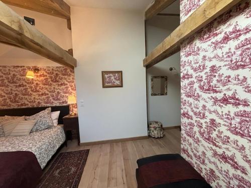 Postel nebo postele na pokoji v ubytování Au cœur de la Citadelle