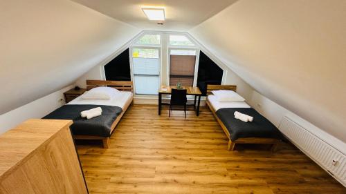 Postel nebo postele na pokoji v ubytování Gasthaus Pinneberg