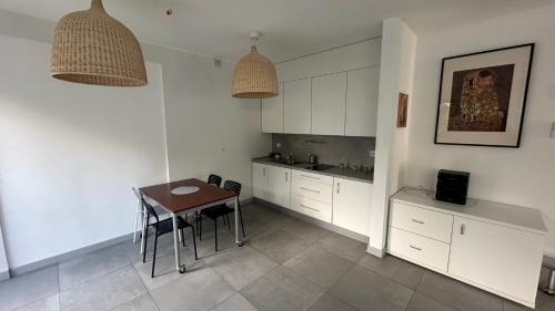 Kuchyň nebo kuchyňský kout v ubytování FAN27 Apartamenty