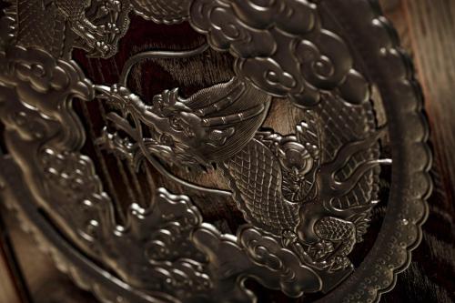 a silver plate with a dragon on it at Hotel Vista Sendai in Sendai