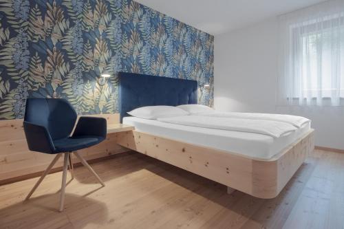 Ένα ή περισσότερα κρεβάτια σε δωμάτιο στο Apartments Haus Gabi