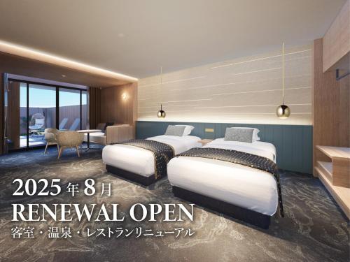 Postel nebo postele na pokoji v ubytování KAMENOI HOTEL Awajishima