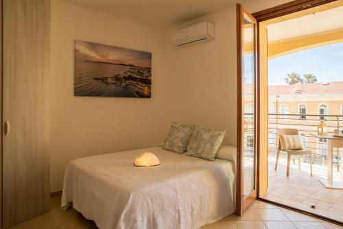 Postel nebo postele na pokoji v ubytování Alghero centro Charme