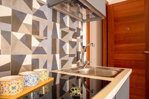 Kuchyň nebo kuchyňský kout v ubytování Alghero centro Charme