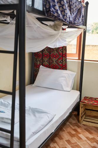 Villa Viva Tanzaniaにあるベッド