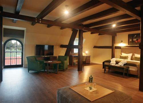 Postel nebo postele na pokoji v ubytování Farmer Hotel Basedow