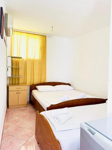 Bunec Seascape Villa Apartmentsにあるベッド