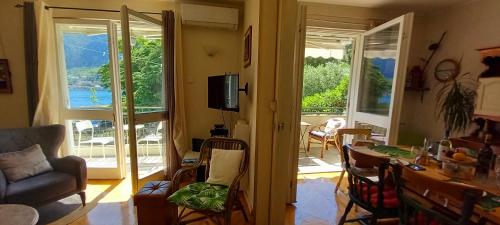 a living room with a view of a living room at Apartment Navigator's lodging in Kotor