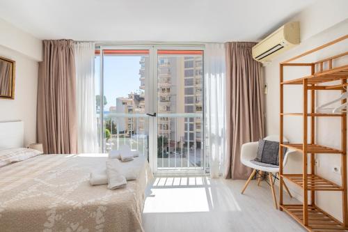 Postel nebo postele na pokoji v ubytování Apartamento Frente al Mar Con Parking