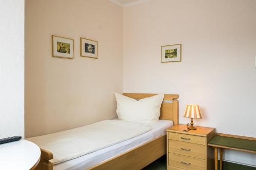 Katil atau katil-katil dalam bilik di Hotel Brinkum - Garni