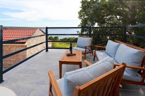 Balkón nebo terasa v ubytování Stone villa with open sea views and pool, in the heart of Nature Park, the sound of silence - by TRAVELER tourist agency Krk - ID 2681