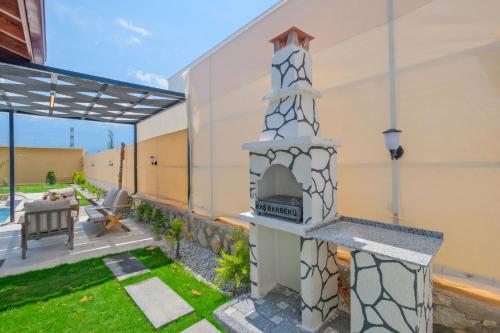 Taman di luar ADER DOĞA Villaları 7