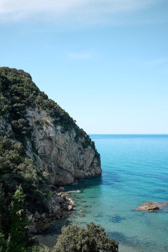 a view of the ocean from a cliff at Alkyna Lifestyle Beach Resort - Adults Only in Agios Gordios