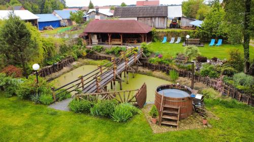 an aerial view of a garden with a water feature at Gospodarstwo Agroturystyczne Pod Lasem Maria Płazio in Narol