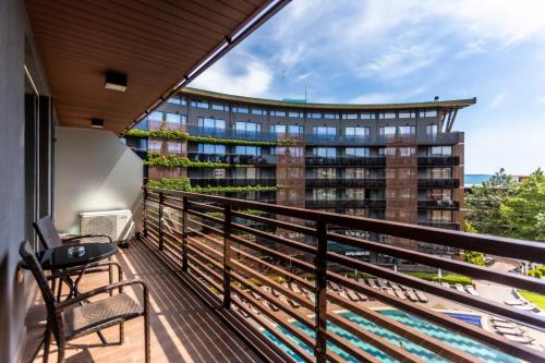 a balcony with a view of a building at Galeon Residence & SPA in Sunny Beach