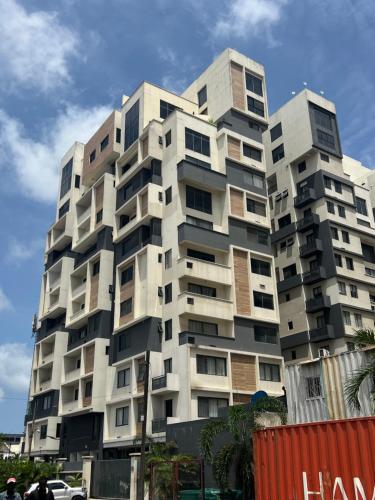 a tall apartment building with many windows at Orbit Apartments in Lagos