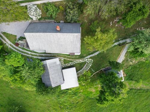an overhead view of a house with a yard at Holiday Homes Pr Pelaku with Sauna in Slappe dʼIdria