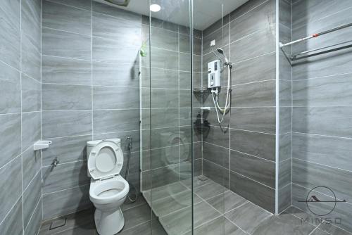 a bathroom with a toilet and a glass shower at KSL Daya JB #Studio #SimpleStyle #2Pax in Johor Bahru