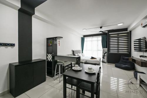 a kitchen and living room with a table and a dining room at KSL Daya JB #Studio #SimpleStyle #2Pax in Johor Bahru