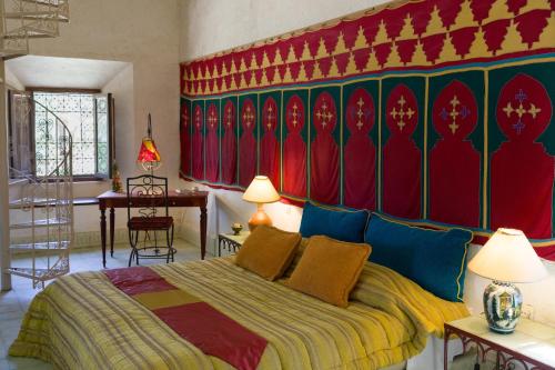 Ένα ή περισσότερα κρεβάτια σε δωμάτιο στο Auberge Ksar Jallal