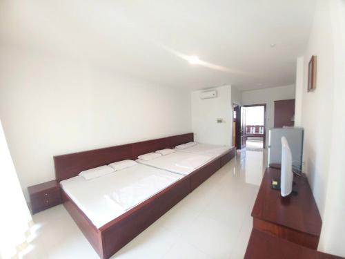 Ένα ή περισσότερα κρεβάτια σε δωμάτιο στο Villa In Great Location - Sea Front