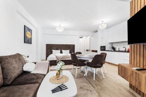 TV/trung tâm giải trí tại Chocolat Studios - Infinity Pool & Spa Resort