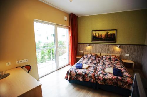 Cama o camas de una habitación en Ranna Villa & FREE PARKING