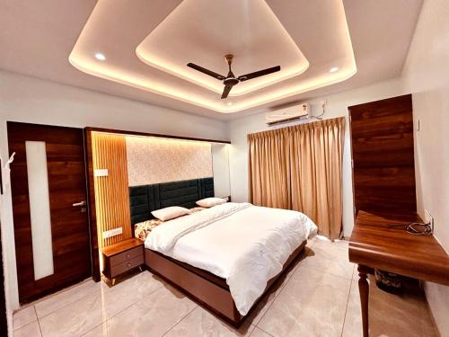 Ένα ή περισσότερα κρεβάτια σε δωμάτιο στο Navishka'S Villa