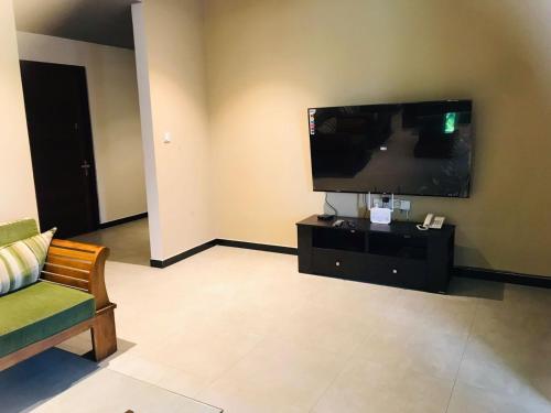TV a/nebo společenská místnost v ubytování Cozy Corner