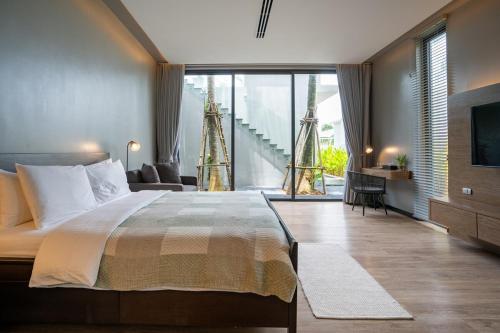 Katil atau katil-katil dalam bilik di Luxury Beachfront Sea-View Retreat & Pool in Natai