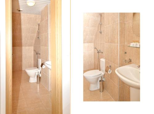 a bathroom with a toilet and a sink at Family Hotel Vega in Saints Constantine and Helena