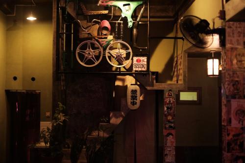 a cross with clocks on it in a room at Abrakadabra Manshon in Timuran
