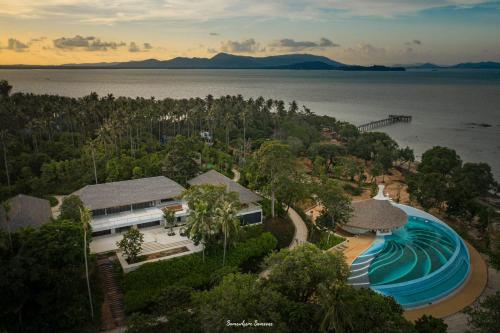 an aerial view of a house with a swimming pool at Island Escape Burasari in Phuket Town