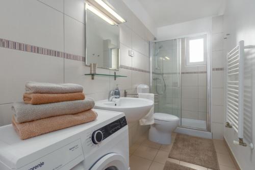 Koupelna v ubytování Apartments Mauri