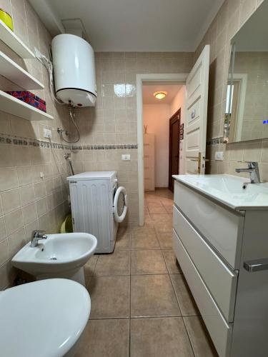 a bathroom with a toilet and a sink at VILLA SISSI Atlantic View in Costa Del Silencio
