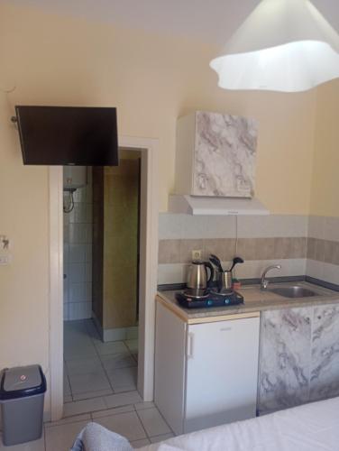 Η κουζίνα ή μικρή κουζίνα στο Natallia Appartments