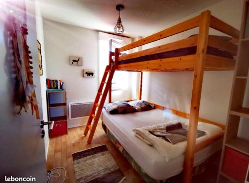 Ένα ή περισσότερα κρεβάτια σε δωμάτιο στο Le Mimi'Zen