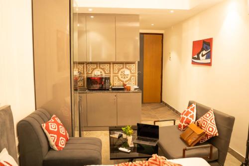 Χώρος καθιστικού στο House Of Stays - Serviced Studio Apartments