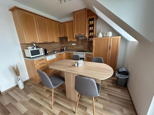 Kuchyň nebo kuchyňský kout v ubytování Mirabell apartman