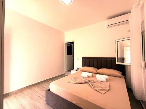 Ένα ή περισσότερα κρεβάτια σε δωμάτιο στο Quiet Blue Guesthouse