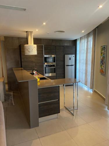 A kitchen or kitchenette at Iris loft