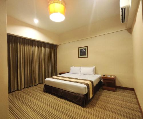 Postel nebo postele na pokoji v ubytování Pearl View Hotel Prai, Penang